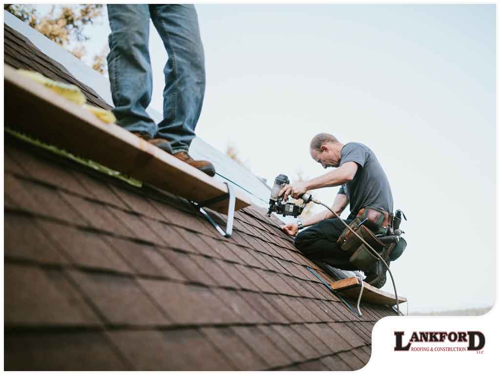 Lankford Roofing professionals installing a residential roof replacement