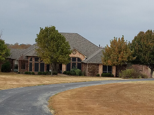 Completed roof replacement on a Denison, TX home