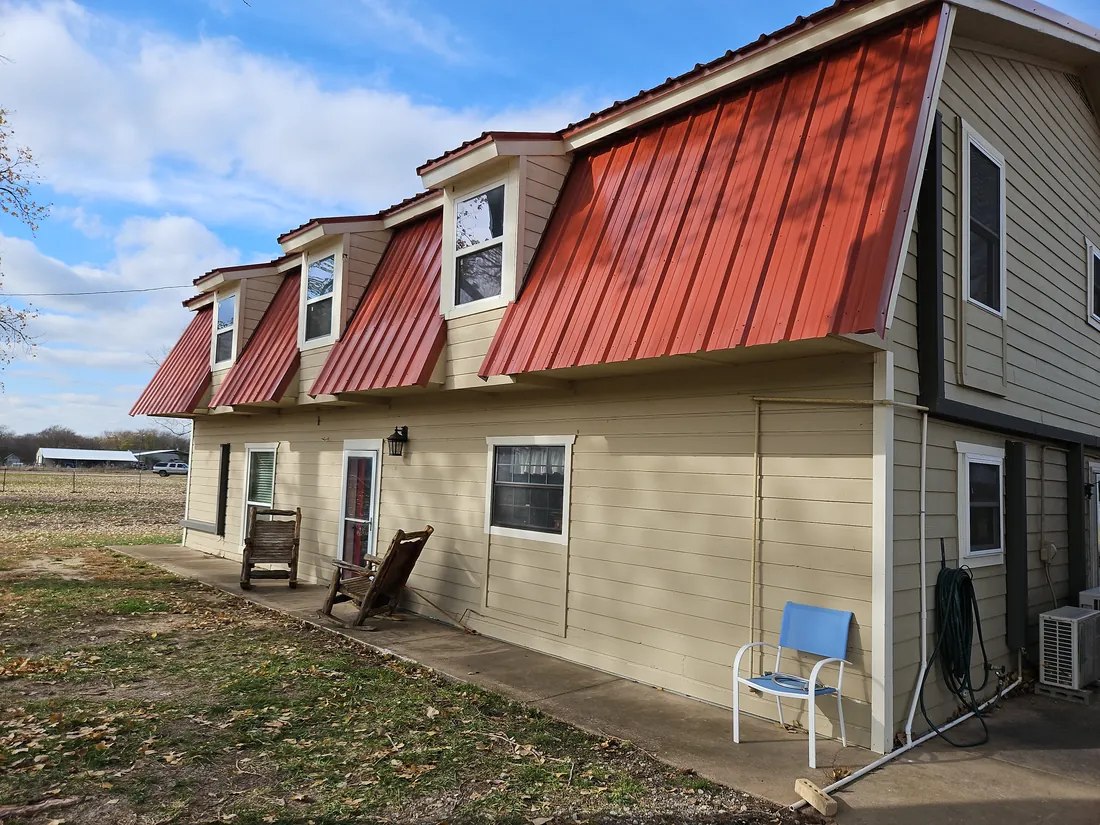 R-Panel Metal Roofs on a House and Barn in Blue Ridge, TX - Lankford Roofing