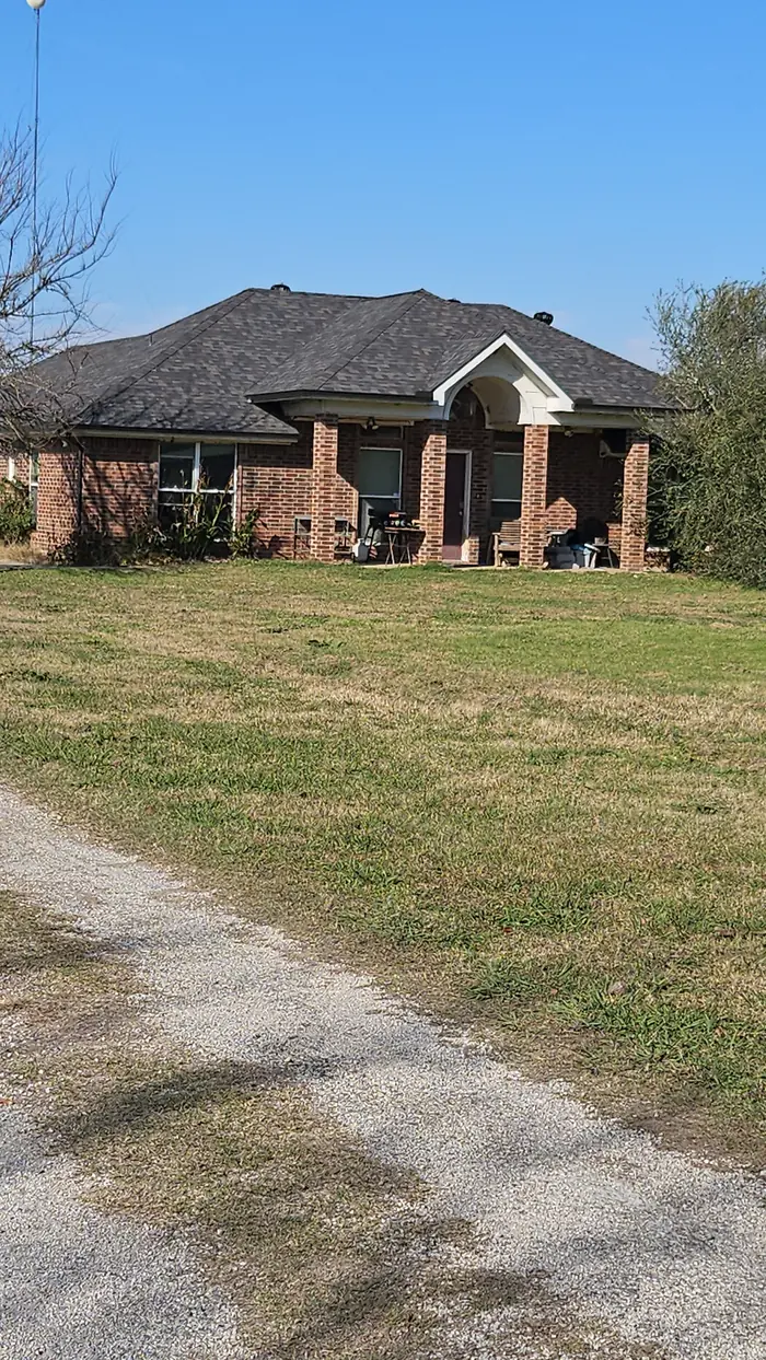 The Denison home with its new Owens Corning Duration roof and gutters