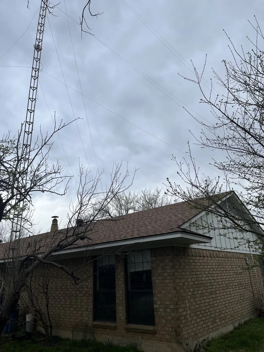 Gable end of the Denison home showing the new architectural shingle roof