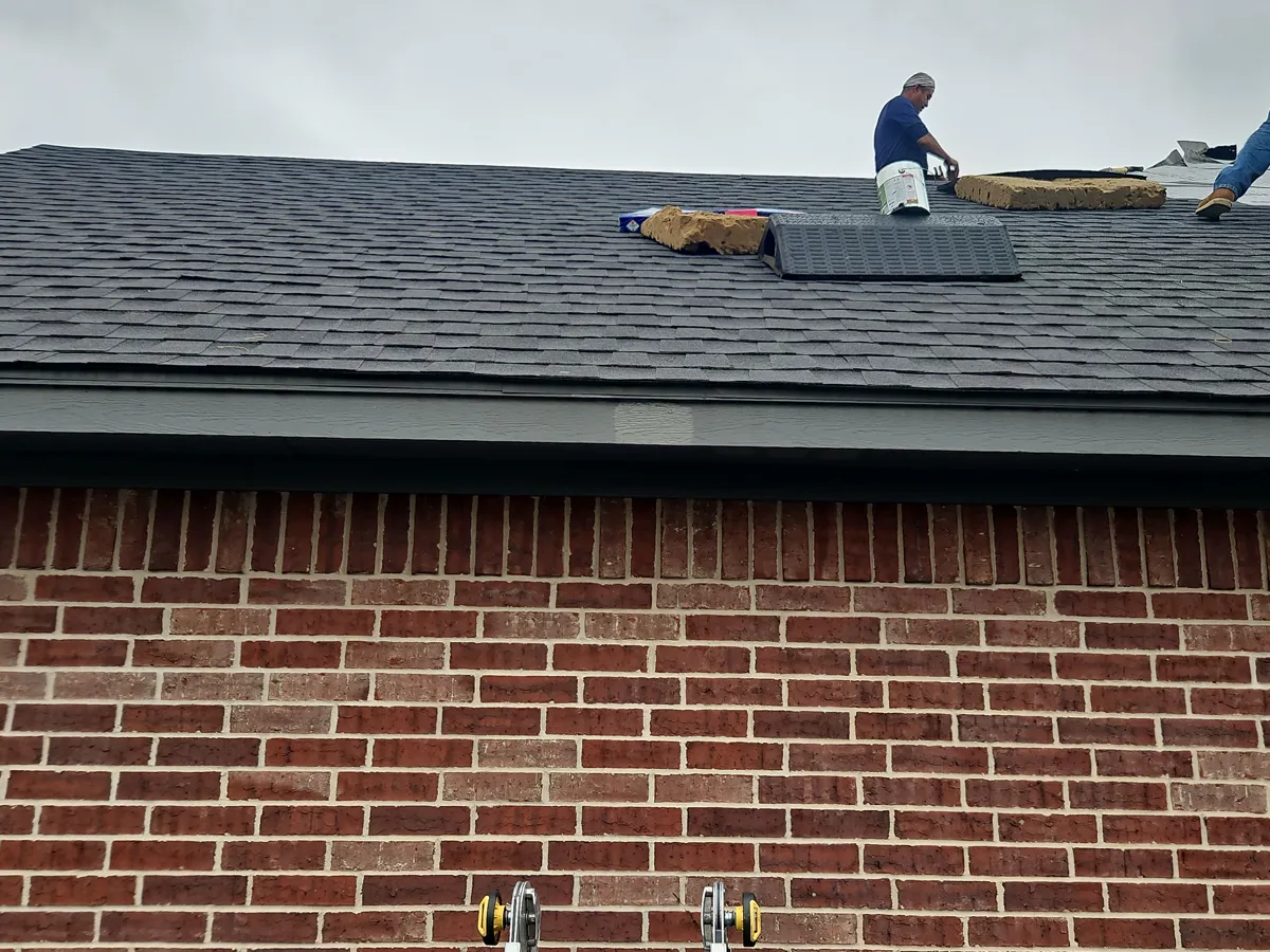 Durant, OK: new shingles going on over the repaired deck