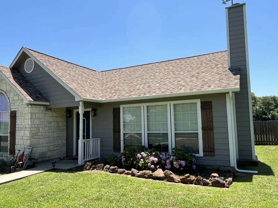 Front elevation of the Gainesville home with its new shingle roof