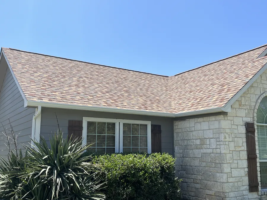 Side view of the completed Gainesville roof and stone elevation