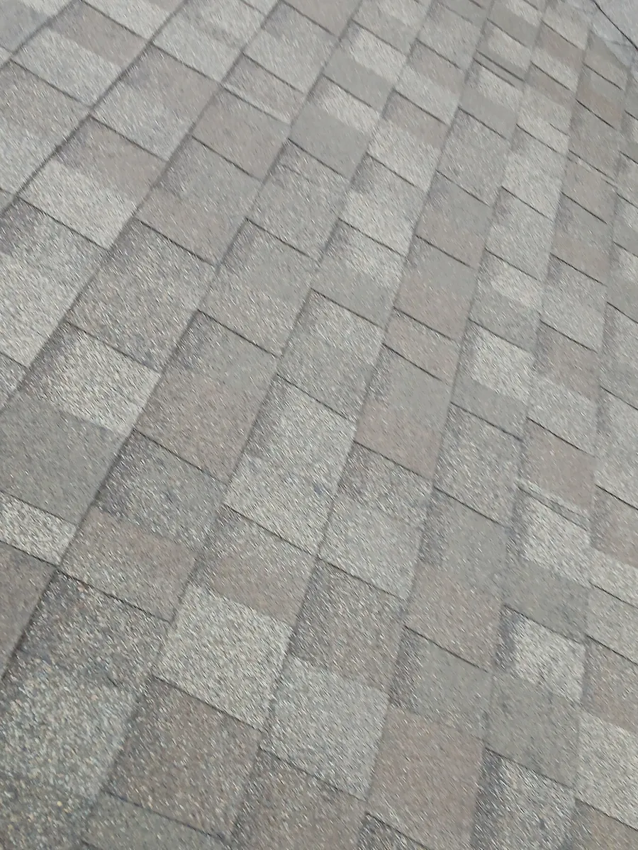 Close view of the new architectural shingles on the finished Sherman roof