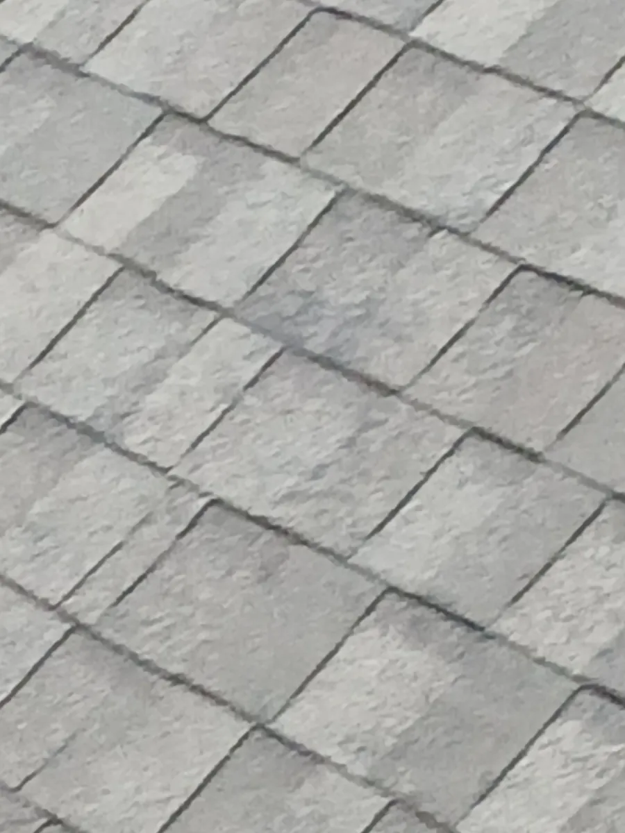 Shingle detail at the edge of the finished Sherman roof